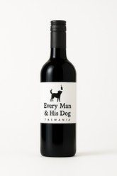 Wine bottle labeled 'Every Man & His Dog Tasmania' on a white background